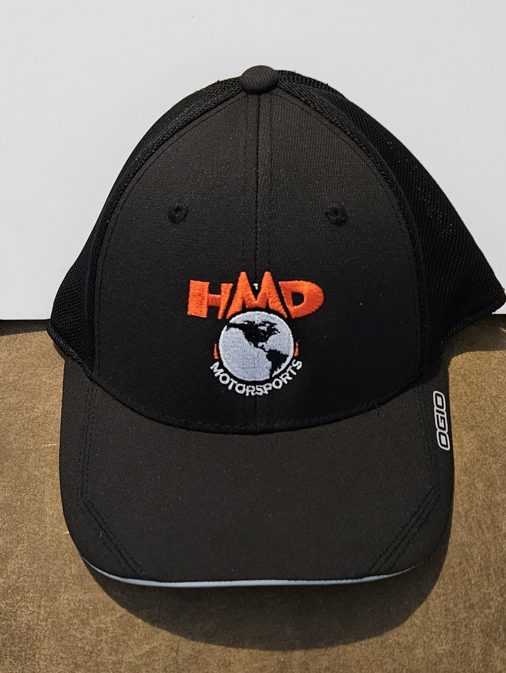 Ogio Brand Featuring HMD Motorsports Racing Team Black Logo Trucker Hat